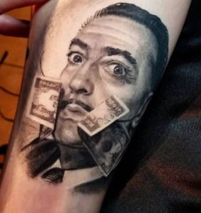 black and white Salvador Dali tattoo