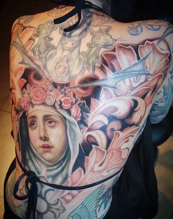 Nina Kate nun back mural tattoo